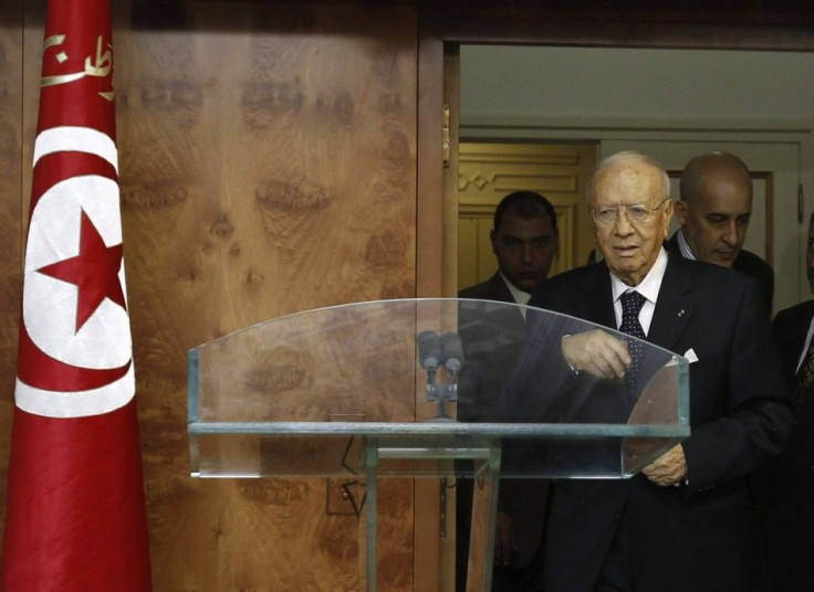 Tunisian interim prime minister Beji Caid Sebsi arrives to a news conference in Tunis