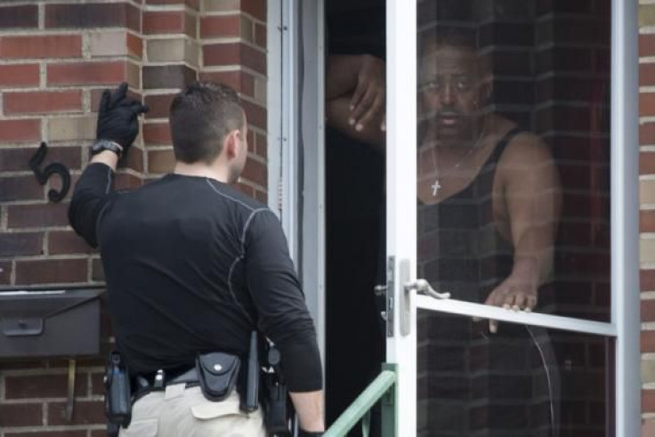 Ferguson cop interviews homeowner