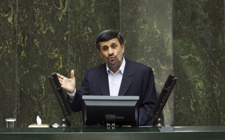 Iran's President Ahmadinejad speaks to lawmakers in parliament in Tehran