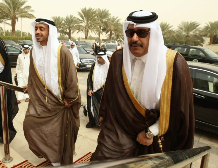 Qatar's Prime Minister Sheikh Hamad bin Jassim bin Jaber al-Thani and U.A.E. Foreign Minister Sheikh Abdullah bin Zayed al-Nahayan 