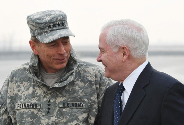 Commander of ISAF Afghanistan General Petraeus chats with US Defense Secretary Gates upon Gates' arrival in Kabul.