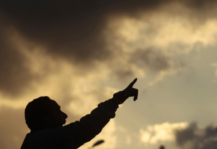 A protester shouts during a protest against Muammar Gaddafi in Benghazi