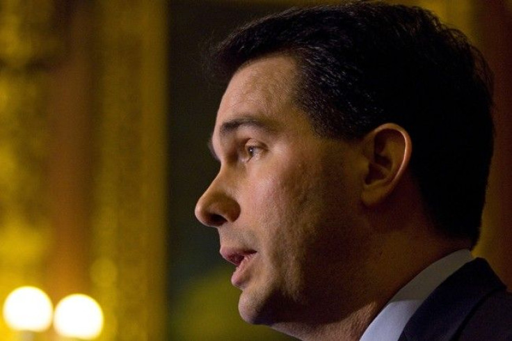 Wisconsin Governor Scott Walker holds a news conference at the state Capitol in Madison, February 25, 2011. 