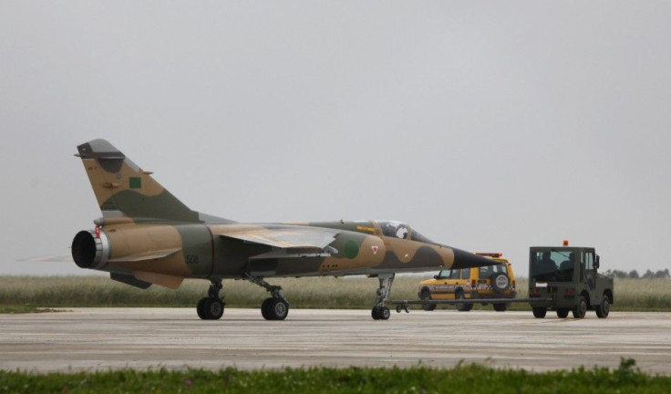 Libyan Air Force Mirage F1 fighter jet is towed to a more secure part of Malta International Airport outside Valletta