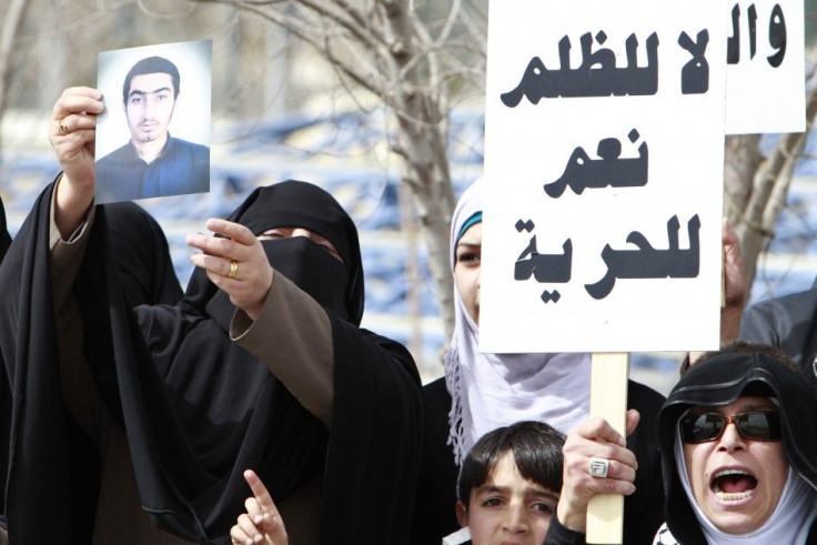 Former Islamist inmates and relatives of political detainees hold a rally demanding the release of prisoners in Amman