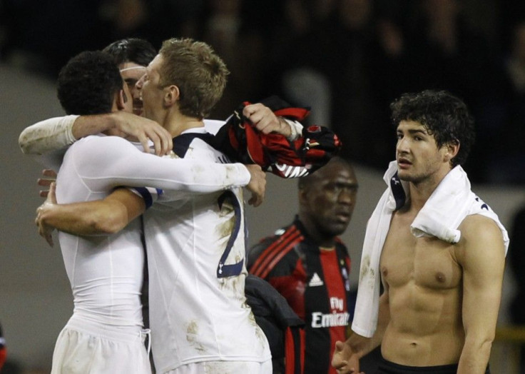 AC Milan's Pato reacts as Tottenham Hotspur celebrate a draw in their Champions League soccer match at White Hart Lane in London.