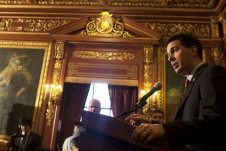 Wisconsin Governor Scott Walker (R-WI) holds a news conference at the state Capitol in Madison, Wisconsin February 25, 2011.