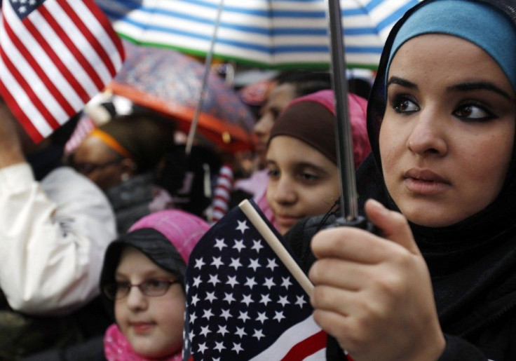 Zienib Noori, 20, of Albany, NY listens to a speaker at the &quot;Today, I Am A Muslim, Too&quot; rally in New York City