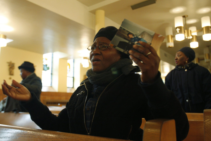 woman praying in a brooklyn church