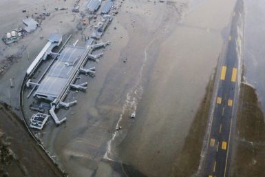 An aerial view of a tsunami swamped Sendai Airport in northeastern Japan March 11, 2011. A massive 8.9 magnitude quake hit northeast Japan on Friday, causing many injuries, fires and a ten-metre (33-ft) tsunami along parts of the country's coastline