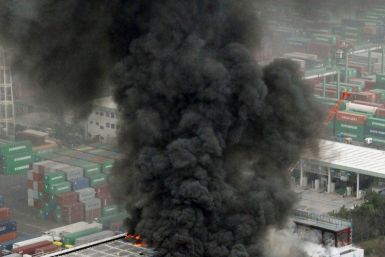 An office building burns in Tokyo after an earthquake March 11, 2011. A massive 8.9 magnitude quake hit northeast Japan on Friday, causing many injuries, fires and a four-metre (13-ft) tsunami along parts of the country's coastline, NHK television and wit