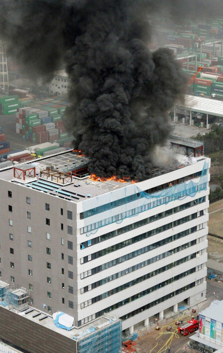 An office building burns in Tokyo after an earthquake March 11, 2011. A massive 8.9 magnitude quake hit northeast Japan on Friday, causing many injuries, fires and a four-metre (13-ft) tsunami along parts of the country's coastline, NHK television and wit