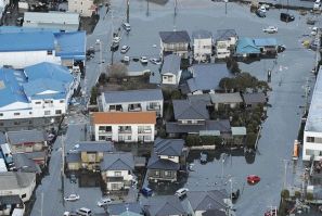 Streets are flooded after an earthquake in Oarai City in Ibaragi Prefecture, northeastern Japan March 11, 2011. 