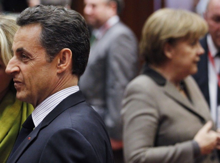 France's President Sarkozy and German Chancellor Merkel take part in EU extraordinary leaders summit in Brussels