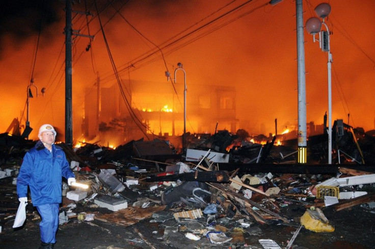 Houses lie flattened after a powerful earthquake in Iwaki, Japan