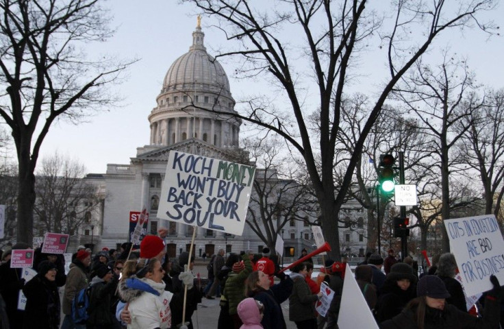 Protesters maintain a presence outside the Wisconsin State Capitol as the Wisconsin State Assembly meets in Madison, Wisconsin