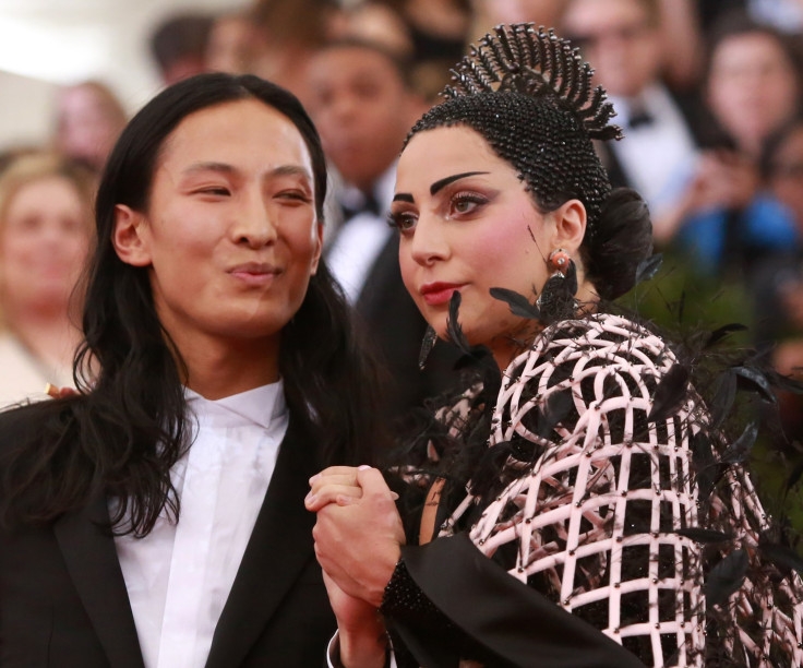 [14:07] U.S. singer Lady Gaga (R) is seen with American fashion designer Alexander Wang after arriving for the Metropolitan Museum of Art Costume Institute Gala 2015 