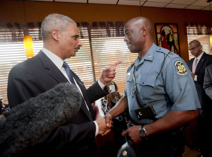 Eric Holder Capt Johnson