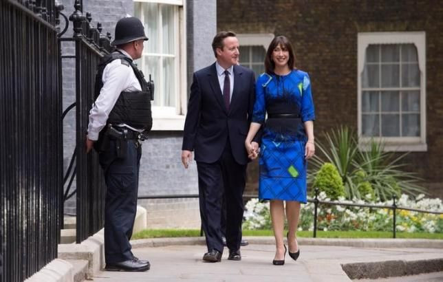 Cameron and wife