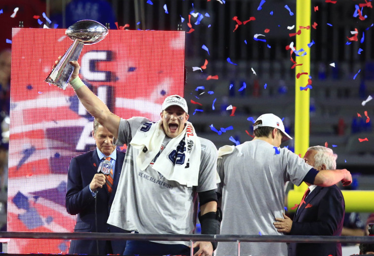 [11:55] New England Patriots tight end Rob Gronkowski holds the Vince Lombardi Trophy after defeating the Seattle Seahawks 28-24 in Super Bowl XLIX 