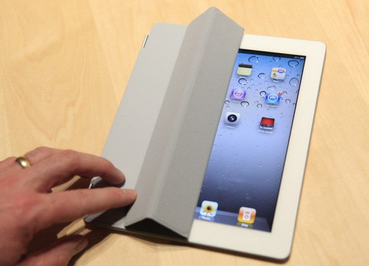 The iPad 2 with a Smart Cover is shown in use in the demonstration area after the iPad 2 launch during an Apple event in San Francisco