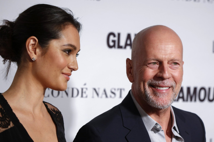 [9:02] Actor Bruce Willis arrives with wife, Emma Heming, for Glamour Magazine's annual Women of the Year award ceremony in New York 