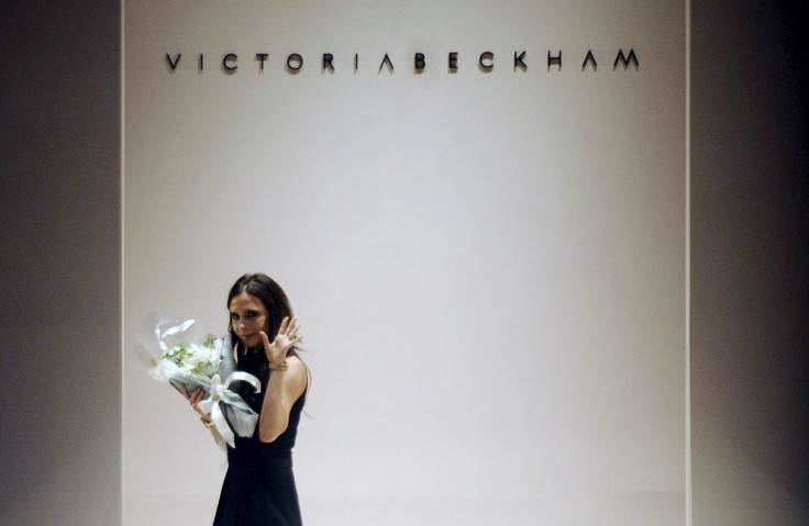 [15:06] Designer Victoria Beckham acknowledges the crowd after presenting her Autumn/Winter 2015 collection during Singapore Fashion Week 