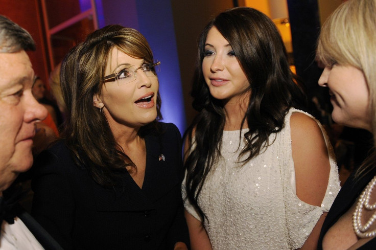 Former Governor of Alaska Sarah Palin (2nd L) talks with her daughter Bristol Palin (2nd R)