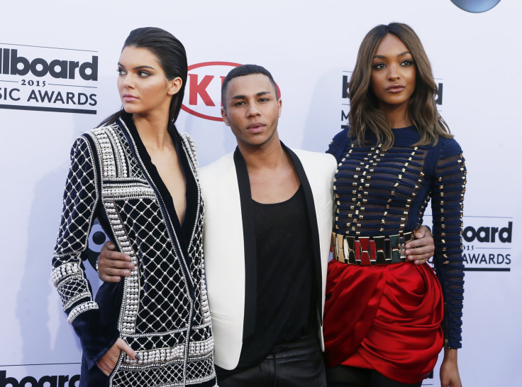[14:53] Model Kendall Jenner (L), designer Olivier Rousteing and model Jourdan Dunn arrive at the 2015 Billboard Music Awards in Las Vegas