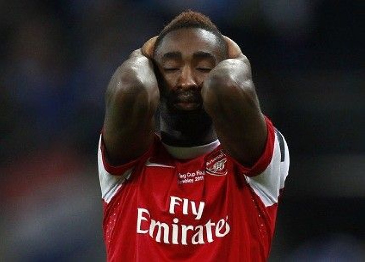 Johan Djourou was hauled off the field against Manchester United