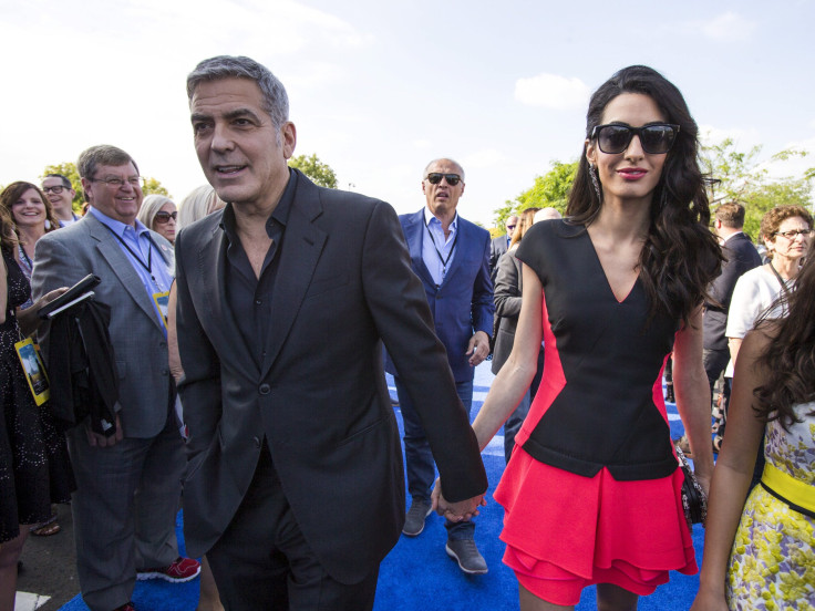  George Clooney with his wife Amal 