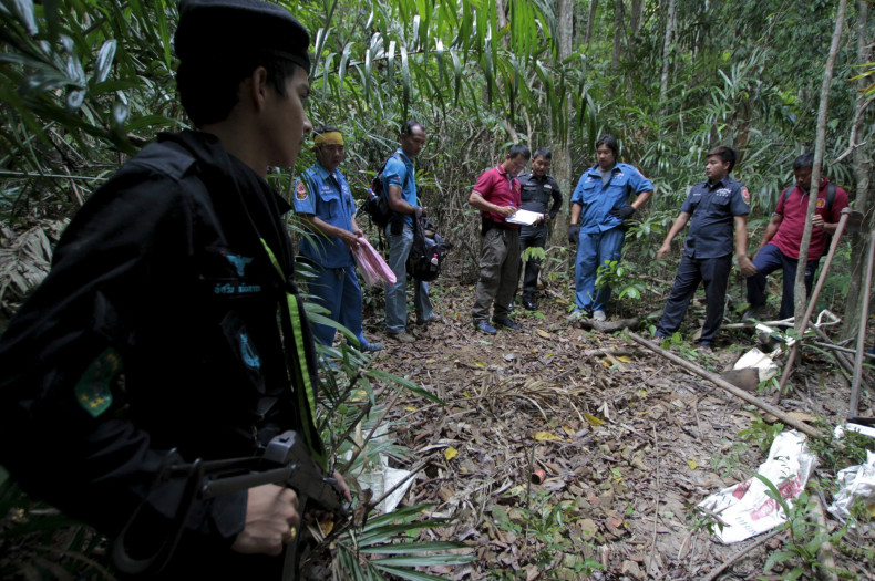 Malaysia migrants mass graves