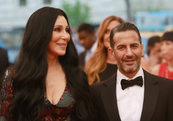 [8:22] U.S. singer Cher arrives with American designer Marc Jacobs for the Metropolitan Museum of Art Costume Institute Gala 2015 
