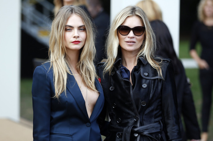 [8:44] Models Cara Delevingne (L) and Kate Moss arrive to attend the presentation of the Burberry Spring/Summer 2015 collection 
