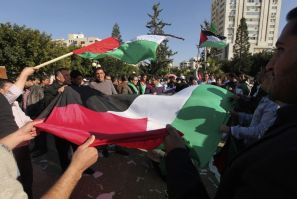 Palestinians take part in a rally in Gaza City, calling for an end to Palestinian divisions