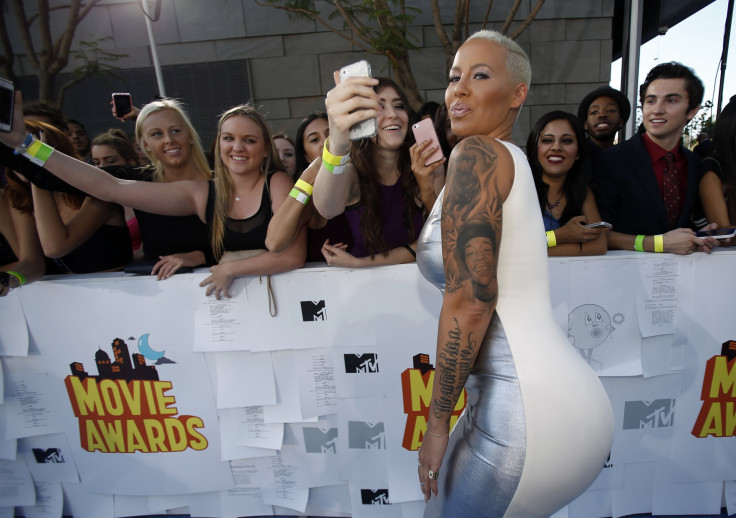 [9:30] Model Amber Rose arrives at the 2015 MTV Movie Awards in Los Angeles, California