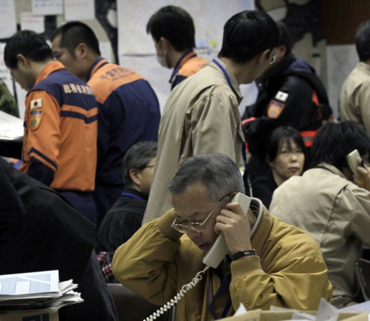Worker at the disaster response headquarters talks on a phone in Fukushima, northern Japan