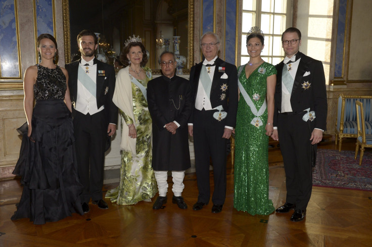 [7:45] (L-R) Miss Sofia Hellqvist, fiancee of Swedish Prince Carl Philip, Queen Silvia, India's President Shri Pranab Mukherjee, Swedish King Carl Gustaf, Crown Princess Victoria and Prince Daniel pose for a group photo