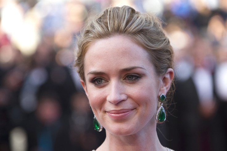 [7:56] Cast member Emily Blunt poses on the red carpet as she arrives for the screening of the film "Sicario" 