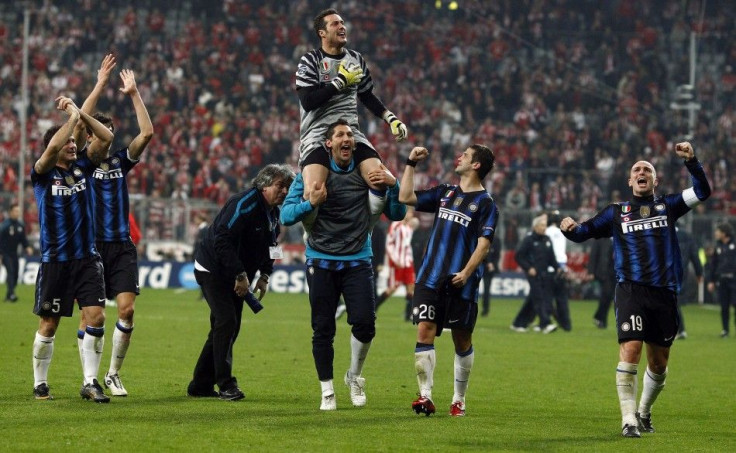 Cesar, goalkeeper of Inter Milan celebrates with team mates after the second leg round of sixteen Champions League soccer match against Bayern in Munich.