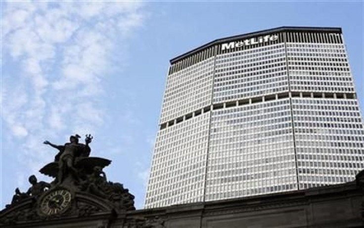 Statue stands atop Grand Central Station in front of the MetLife building in New York