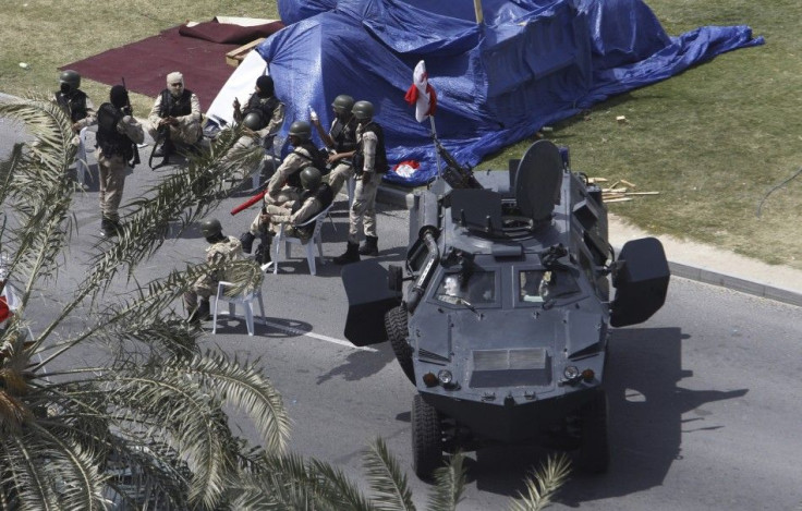 Gulf Cooperation Council (GCC) forces secure the area after evacuating anti-government protesters, in Manama March 16, 2011. Bahraini tanks and armoured personnel carriers moved towards Budaya Street in the capital Manama on Wednesday, minutes before a pr