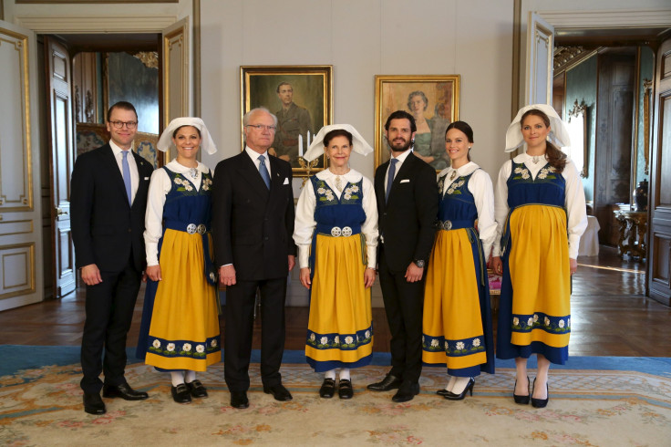 [8:01] (L-R) Prince Daniel, Crown Princess Victoria, King Carl Gustaf, Queen Silvia, Prince Carl Philip, his fiancee Sofia Hellqvist and Princess Madeleine pose for a photograph during a reception at the Royal Palace 