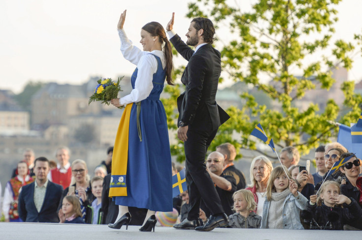 [8:18] Prince Carl Philip and his fiancee Sofia Hellqvist wave during the Sweden National Day celebrations in Stockholm 