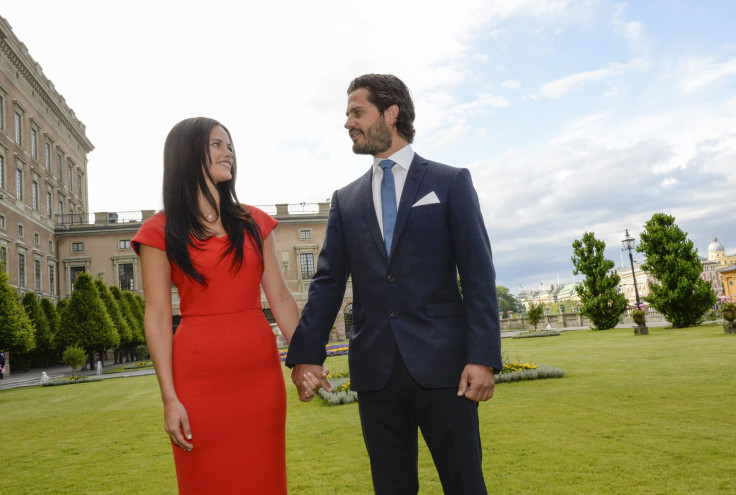 [8:20] Sweden's Prince Carl Philip (R) and Sofia Hellqvist look at each other during their news conference where they announced their engagement at Stockholm Palace