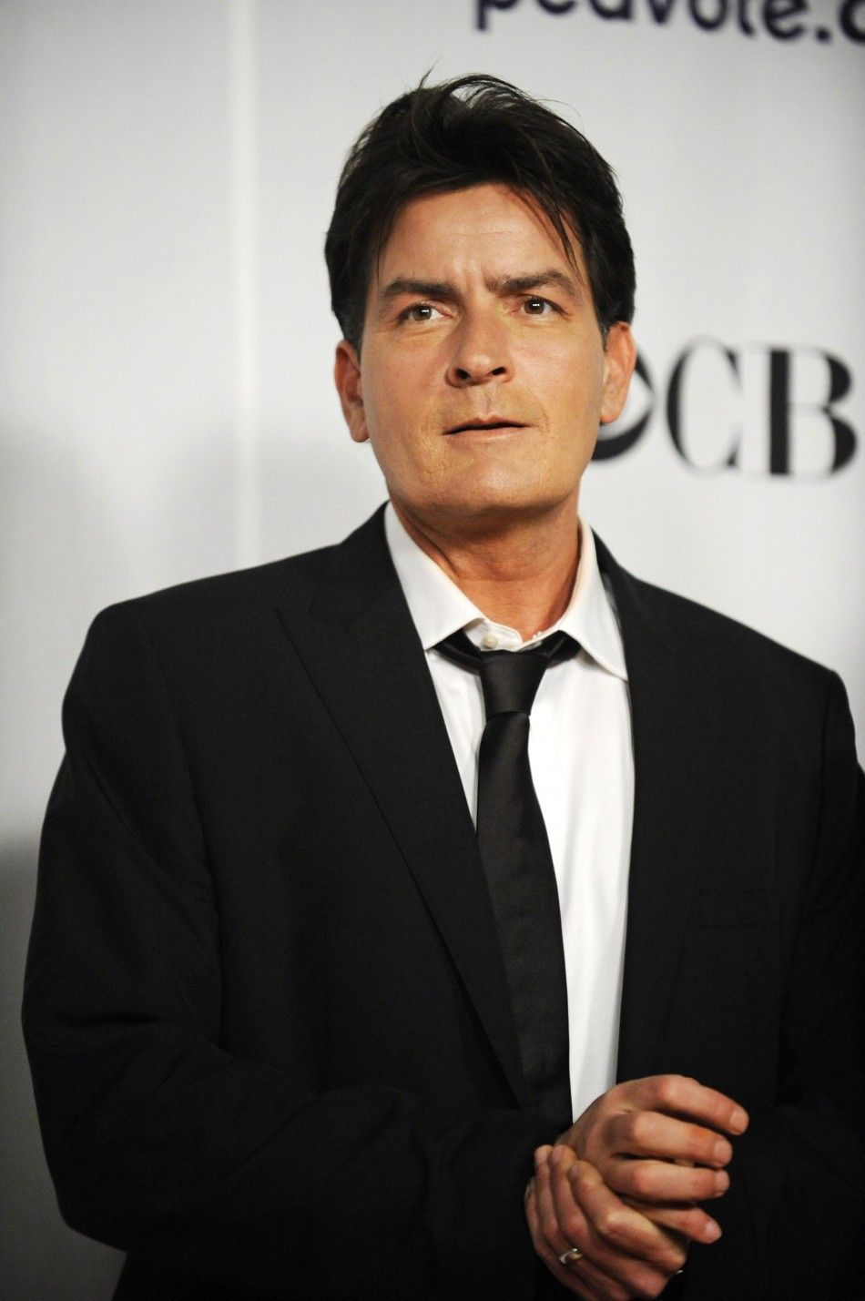 Actor Charlie Sheen stands backstage after winning the award for Favorite TV Comedy for quotTwo and a Half Menquot at the 35th annual Peoples Choice awards in Los Angeles January 7, 2009. 