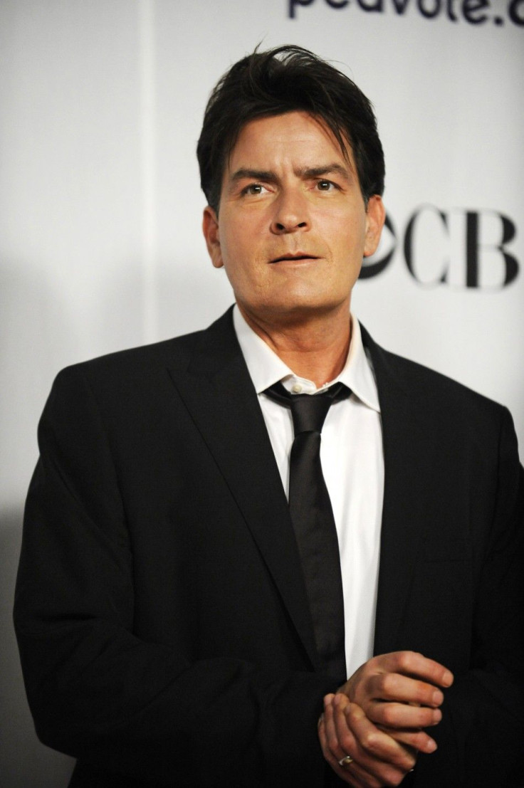 Actor Charlie Sheen stands backstage after winning the award for Favorite TV Comedy for &quot;Two and a Half Men&quot; at the 35th annual People's Choice awards in Los Angeles January 7, 2009. 