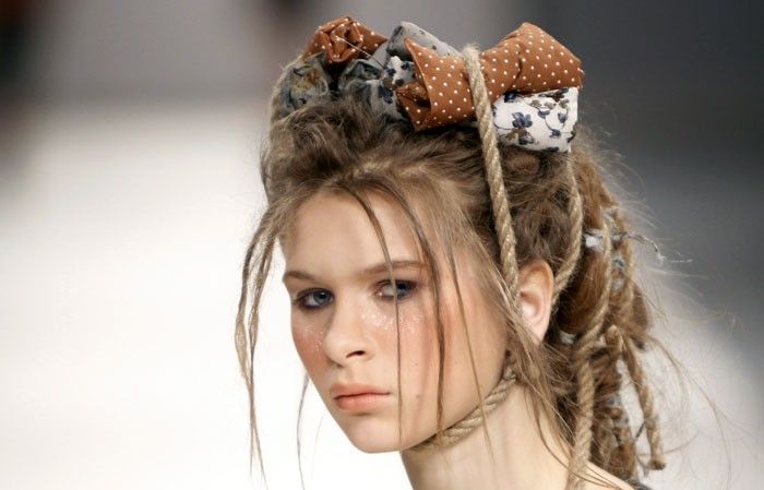 A model presents a creation by Ukrainian designer Burenina during Ukrainian Fashion Week in Kiev