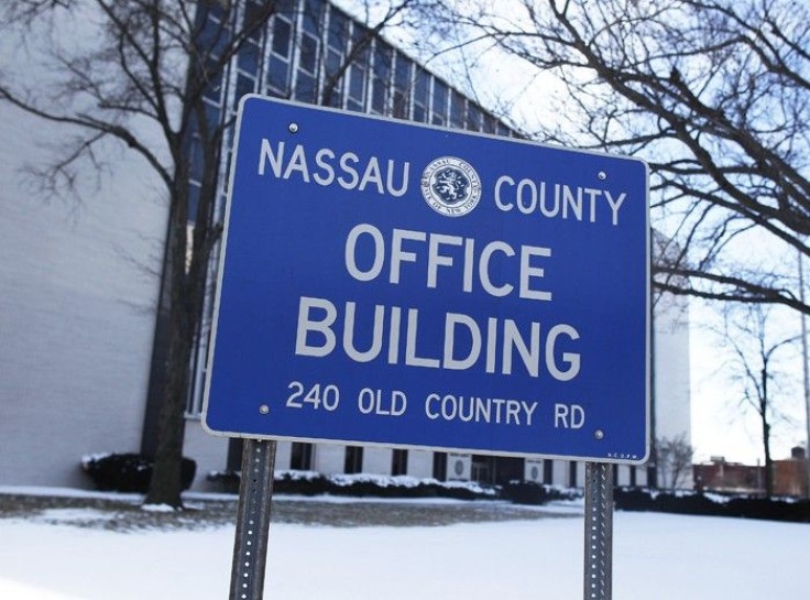 A view of the Nassau County office building sign in Mineola