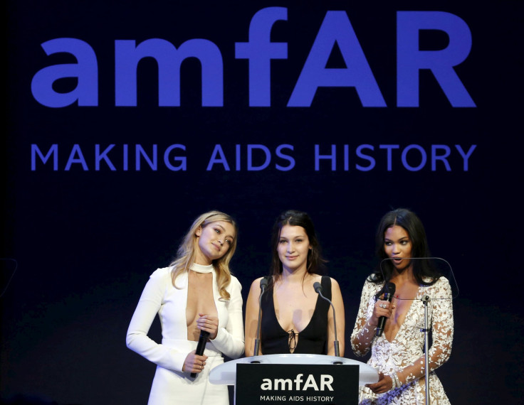 [12:12] U.S. models Gigi Hadid, Bella Hadid and Chanel Iman conduct the auction during the amfAR's Cinema Against AIDS 2015 event